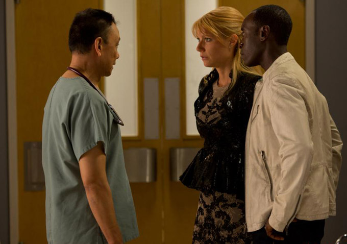 Wang Xueqi (Dr. Wu), Gwyneth Paltrow (Pepper Potts) and Don Cheadle (James Rhodes) in this still from Marvel&rsquo;s Iron Man 3