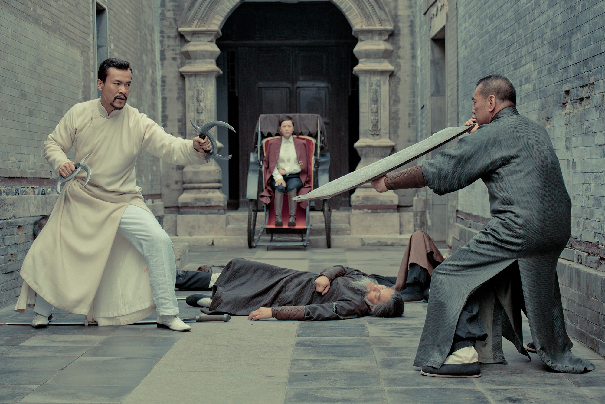 Madam-Zou-(Jiang-Wenli)-looks-on-as-Master-Chen-(Liao-Fan)-battles-in-THE-FIANL-MASTER---photo-courtesy-United-Entertainment-Partners