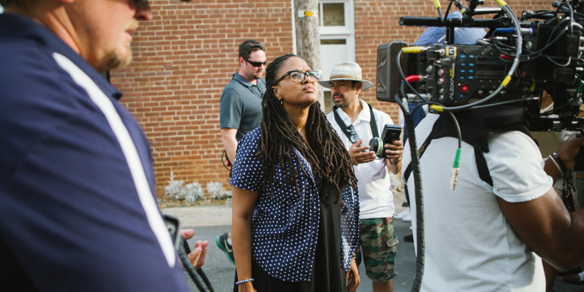 Director/Executive Producer Ava DuVernay (center) on the set of SELMA, from Paramount Pictures, Pathé, and Harpo Films.