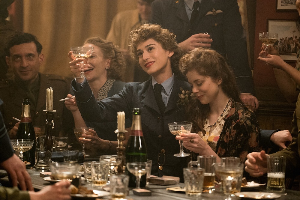 Lizzy Caplan plays Bridget Vatan and Charlotte Hope plays Louise in Allied from Paramount Pictures.