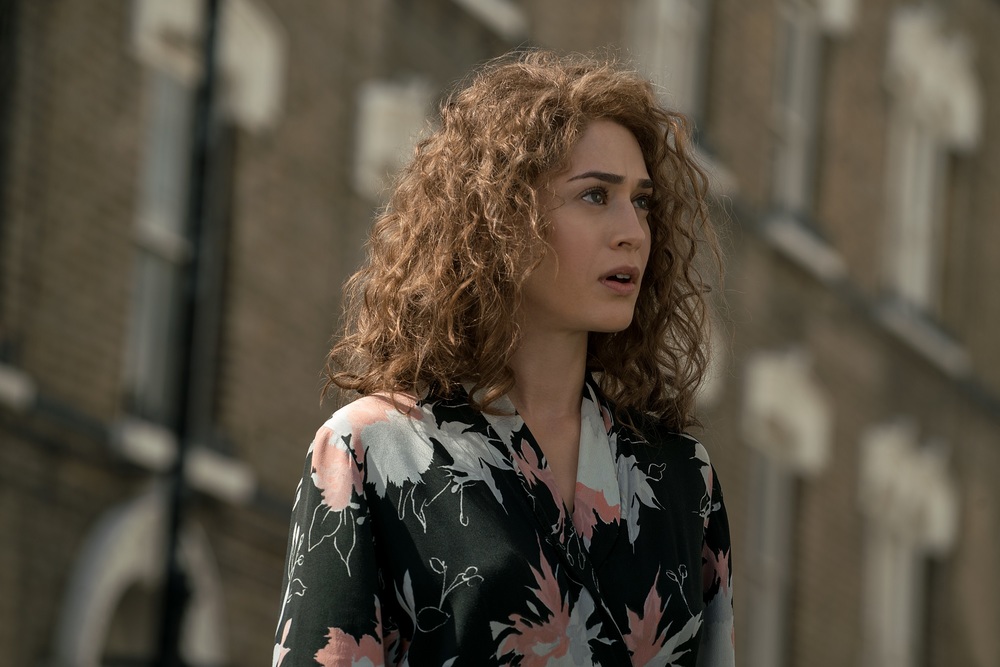 Lizzy Caplan plays Bridget Vatan in Allied from Paramount Pictures.