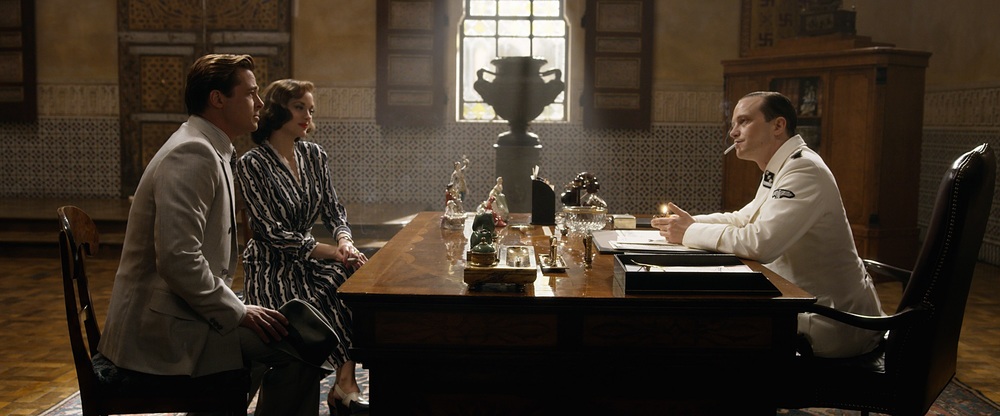 Brad Pitt plays Max Vatan, Marion Cotillard plays Marianne Beausejour and August Diehl plays Hobar in Allied from Paramount Pictures.