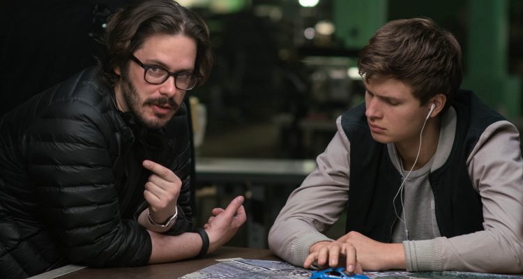Director Edgar Wright (left) and Ansel Elgort on the set of TriStar Pictures' BABY DRIVER.