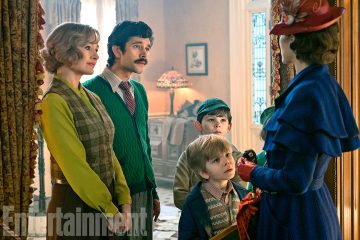 Grown-up-Jane-(Emily-Mortimer)-and-Michael-Banks-(Ben-Whishaw),-plus-Michael’s-sons-Georgie-(Joel-Dawson)-and-John-(Nathanael-Saleh),-welcome-Mary-Poppins-(Emily-Blunt)-Mary-Poppins-Returns