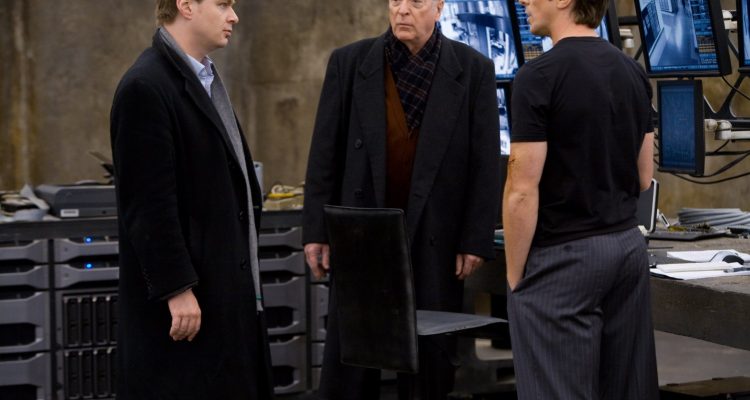 Christian Bale, Michael Caine, and Christopher Nolan in The Dark Knight (2008)