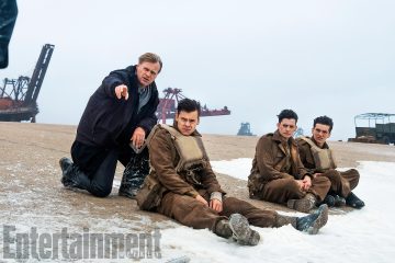 Dunkirk (2017) (L-R) Writer/director/producer CHRISTOPHER NOLAN, HARRY STYLES, ANEURIN BARNARD and FIONN WHITEHEAD on the set DO NOT CROP OUT ANY ACTORS FROM IMAGE WITHOUT APPROVAL FROM WARNER BROS!!!