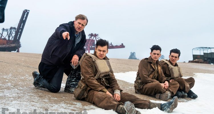 Dunkirk (2017) (L-R) Writer/director/producer CHRISTOPHER NOLAN, HARRY STYLES, ANEURIN BARNARD and FIONN WHITEHEAD on the set DO NOT CROP OUT ANY ACTORS FROM IMAGE WITHOUT APPROVAL FROM WARNER BROS!!!