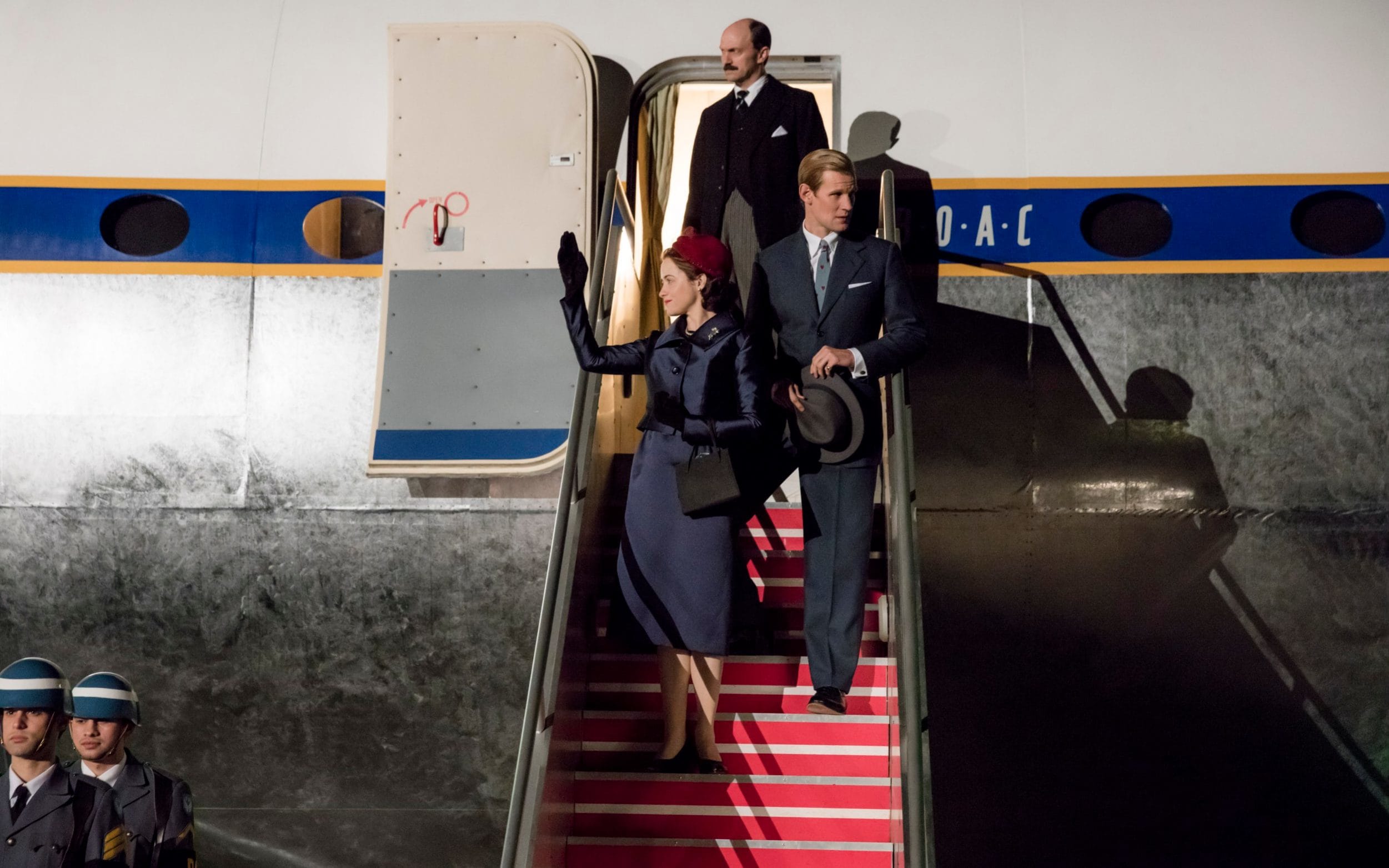 The royal couple return from a world tour with their private secretary, Sir Michael Adeane The Crown season 2