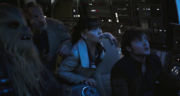 Woody Harrelson, Alden Ehrenreich, Emilia Clarke, and Joonas Suotamo in Solo- A Star Wars Story (2018)