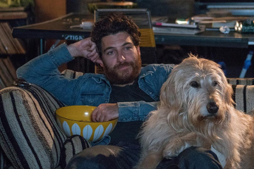 Adam Pally stars as “Dax” with Charlie the dog in Ken Marino’s DOG DAYS, a LD Entertainment release