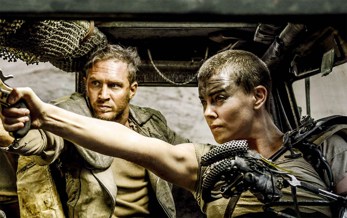 Mad Max: Fury Road': Charlize Theron & Tom Hardy Reflect On Their War & "Horrible" Unsafe Relationship On Set
