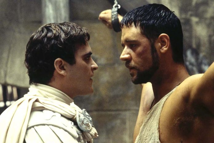 Ridley Scott says Russell Crowe called Joaquin Phoenix 'terribly unprofessional' on 'Gladiator'