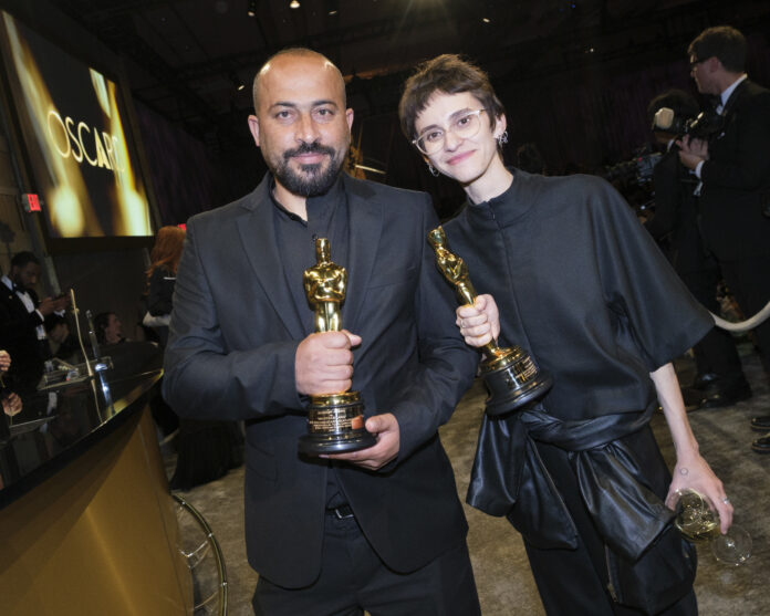 Hamdan Ballal and Rachel Szor get their Oscars® engraved at the Governors Ball following the live ABC telecast of the 97th Oscars® at the Dolby Theatre at Ovation Hollywood in Los Angeles, CA, on Sunday, March 2, 2025.