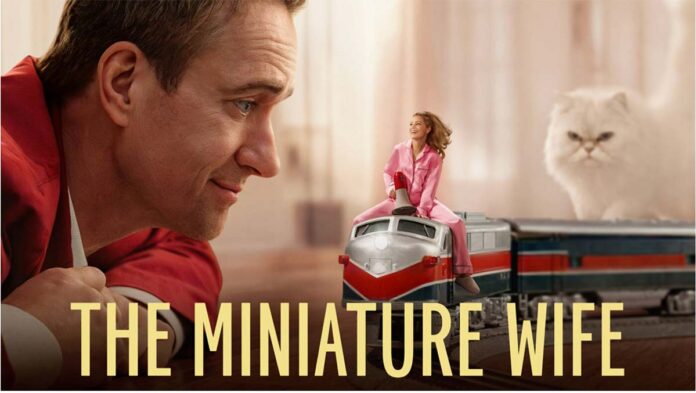 ‘The Miniature Wife’ Trailer: Elizabeth Banks & Matthew Macfadyen Shrink A Marriage Down To Its Sharpest Power Struggle