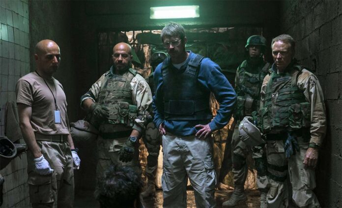 ‘High Value Target: The Hunt For Saddam’ Trailer: Joel Kinnaman Interrogates The Iraqi Dictator In TNT’s Political Thriller
